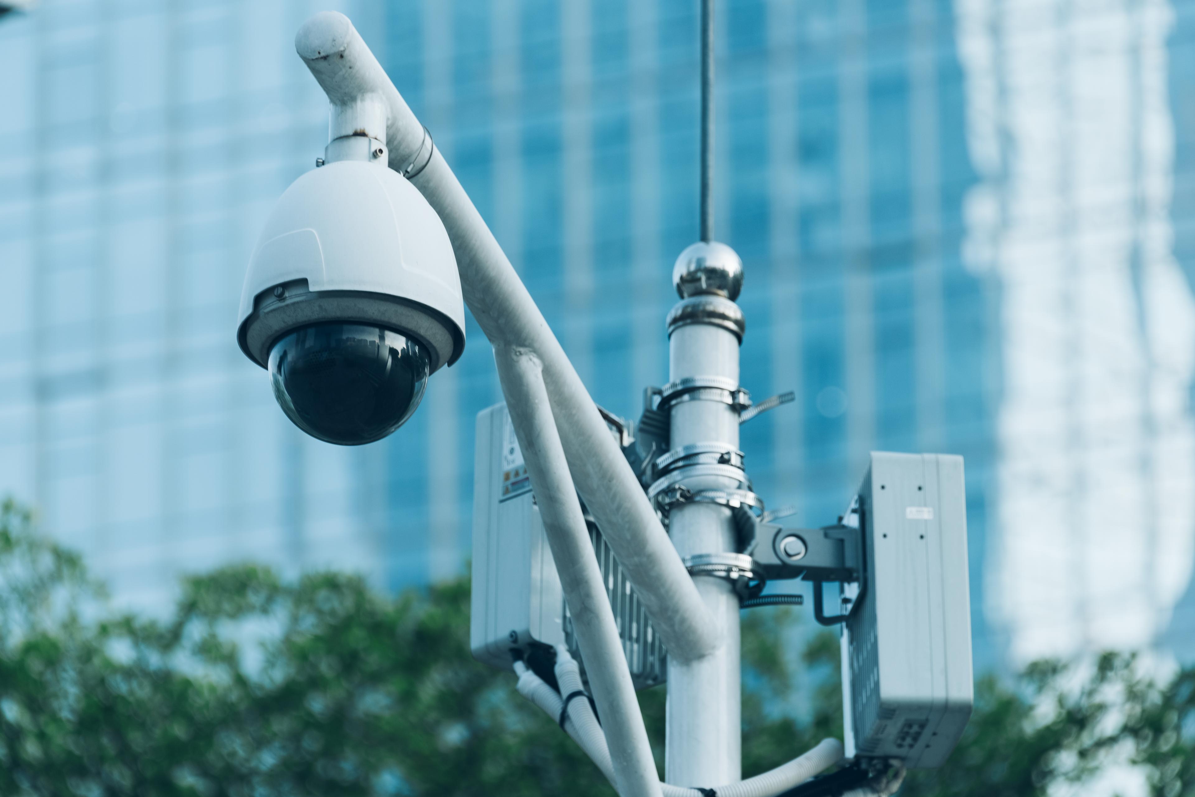 cctv-camera-hung-on-a-pole-by-the-road